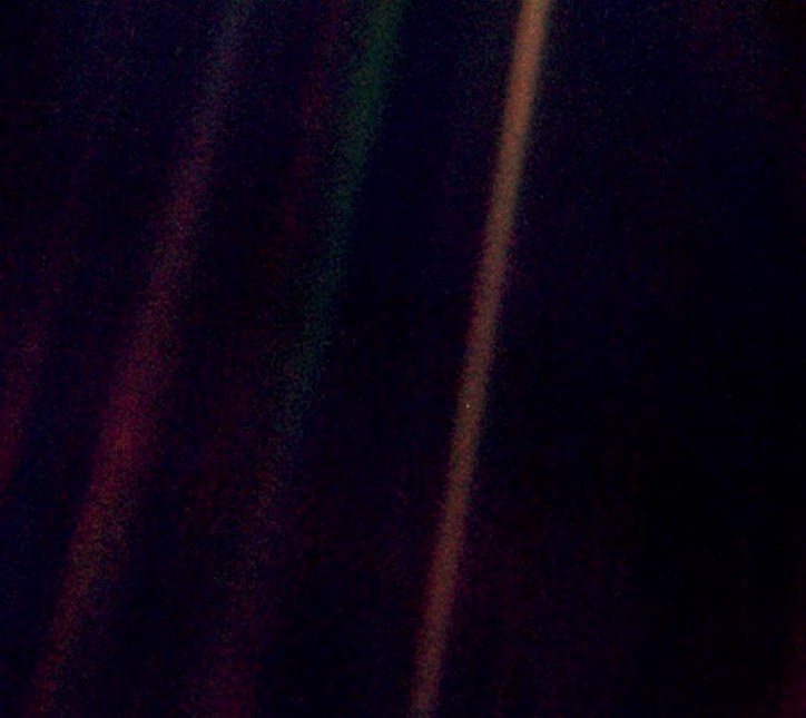 The pale blue dot, about half way down in the right hand band is the Earth from Voyager 1, Carl Sagan had this picture taken. This picture was taken some 6.4 Billion Kilometers from Earth.